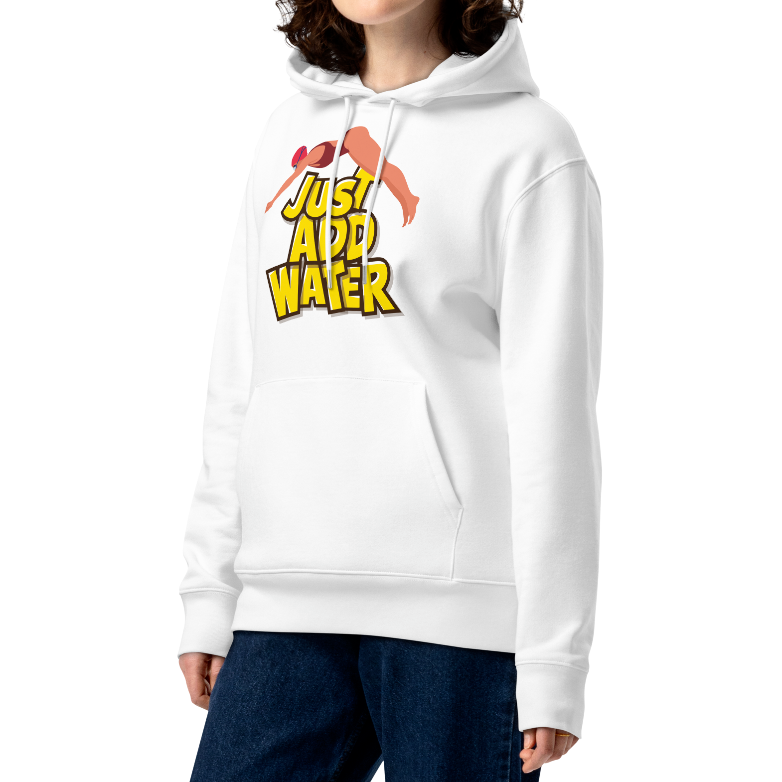 A woman with curly brown hair wearing an organic hoodie in white by Lane Line Threads with a “Just Add Water” swim graphic and female swimmer illustration, made from GOTS and OCS certified organic cotton.