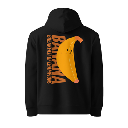 Organic hoodie in black by Lane Line Threads with a smiling banana and "Banana Breakfast Champion" text graphic, made from GOTS and OCS certified organic cotton.