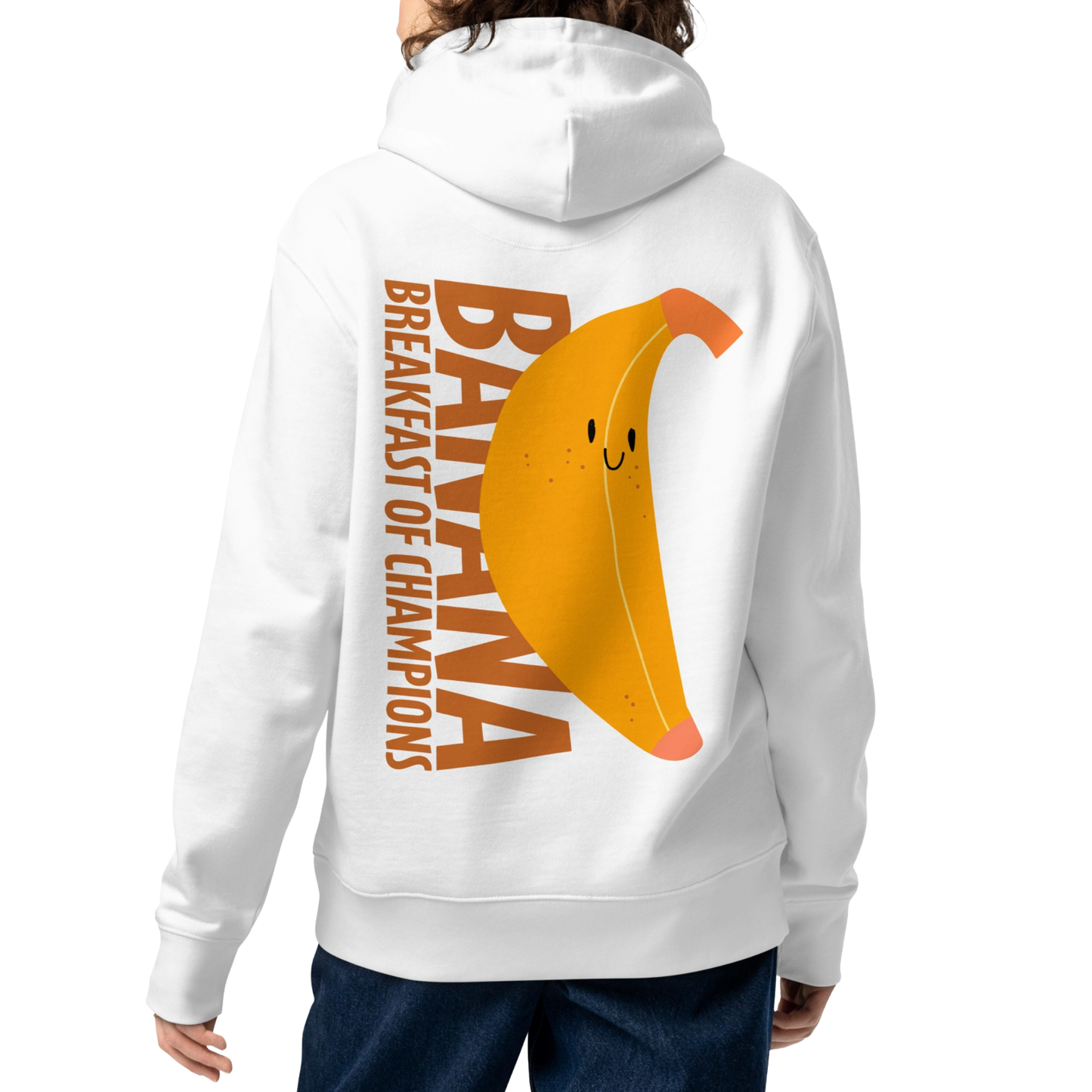 A person shown from the back wearing an organic hoodie in white by Lane Line Threads with a smiling banana and "Banana Breakfast Champion" text graphic, made from GOTS and OCS certified organic cotton.