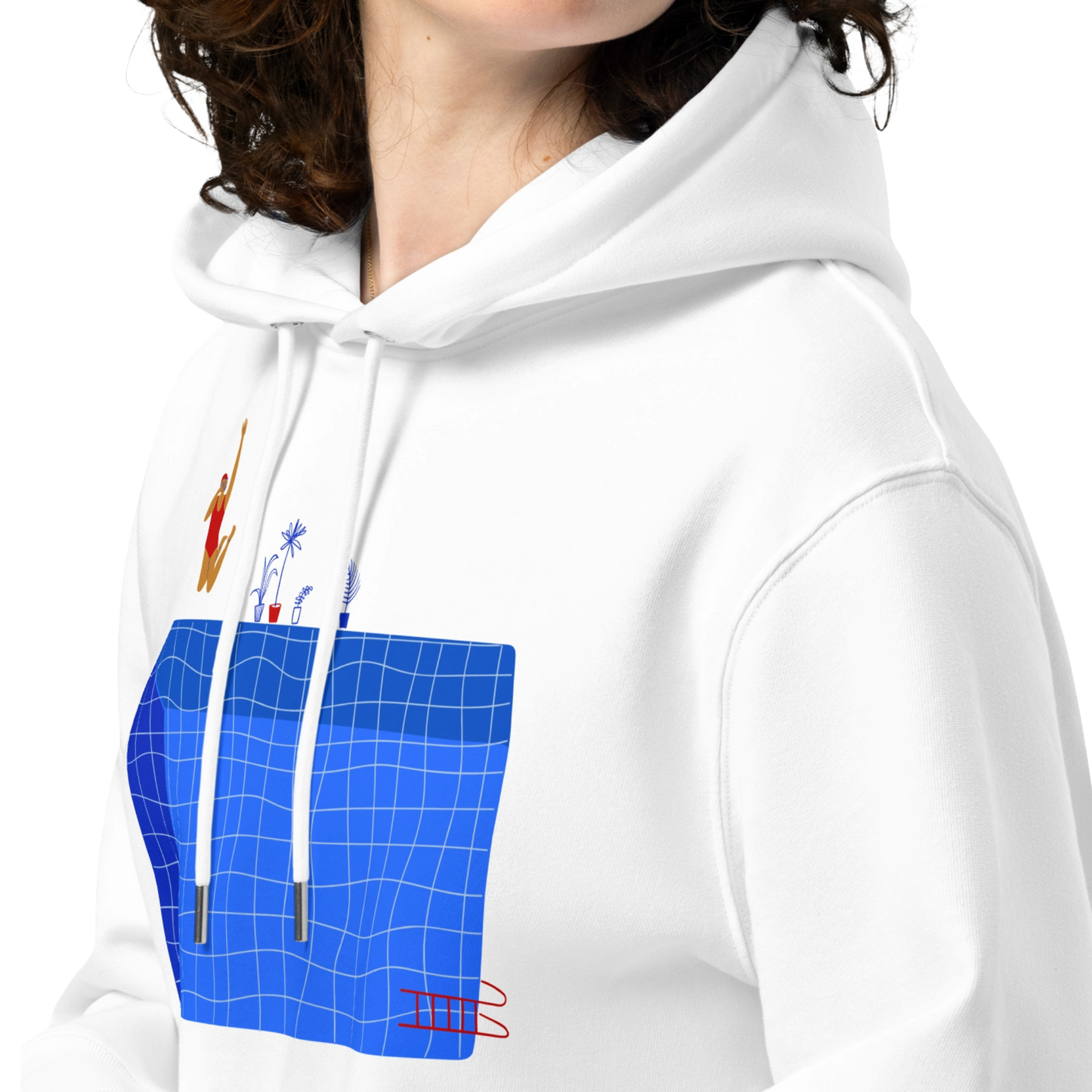 A close-up of a person wearing an organic hoodie in white by Lane Line Threads with a blue pool graphic and swimmer illustration, made from GOTS and OCS certified organic cotton.