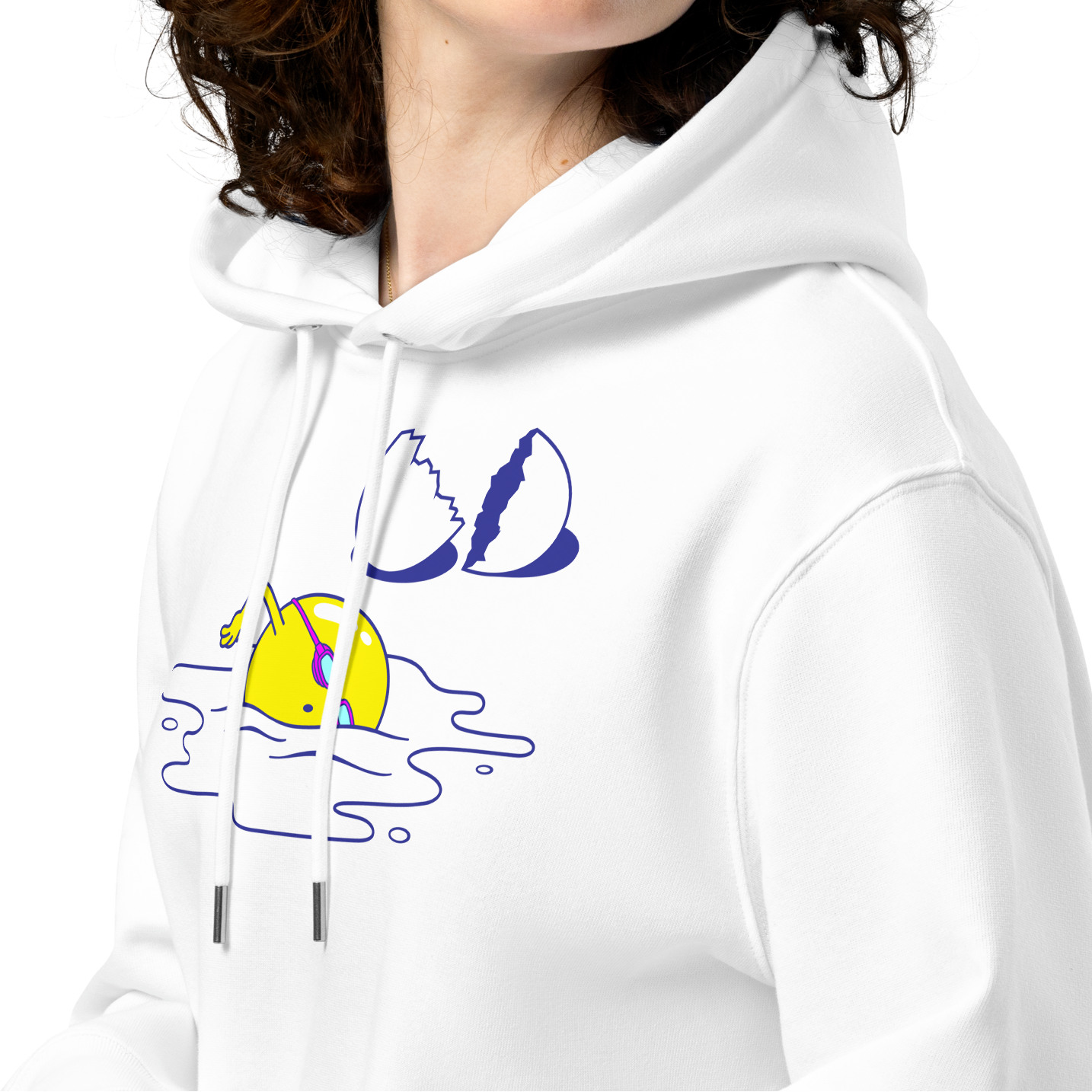 A person wearing an organic hoodie in white by Lane Line Threads featuring a graphic of a swimming yellow egg yolk with goggles and a cracked shell, set against a plain white background.