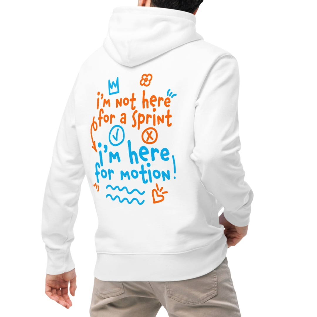 A person shown from the back wearing an organic hoodie in beige by Lane Line Threads with “I’m not here for a sprint I’m here for motion!” swim graphic in blue and orange for recreational swimmers.