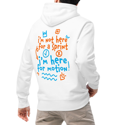 A person shown from the back wearing an organic hoodie in beige by Lane Line Threads with “I’m not here for a sprint I’m here for motion!” swim graphic in blue and orange for recreational swimmers.