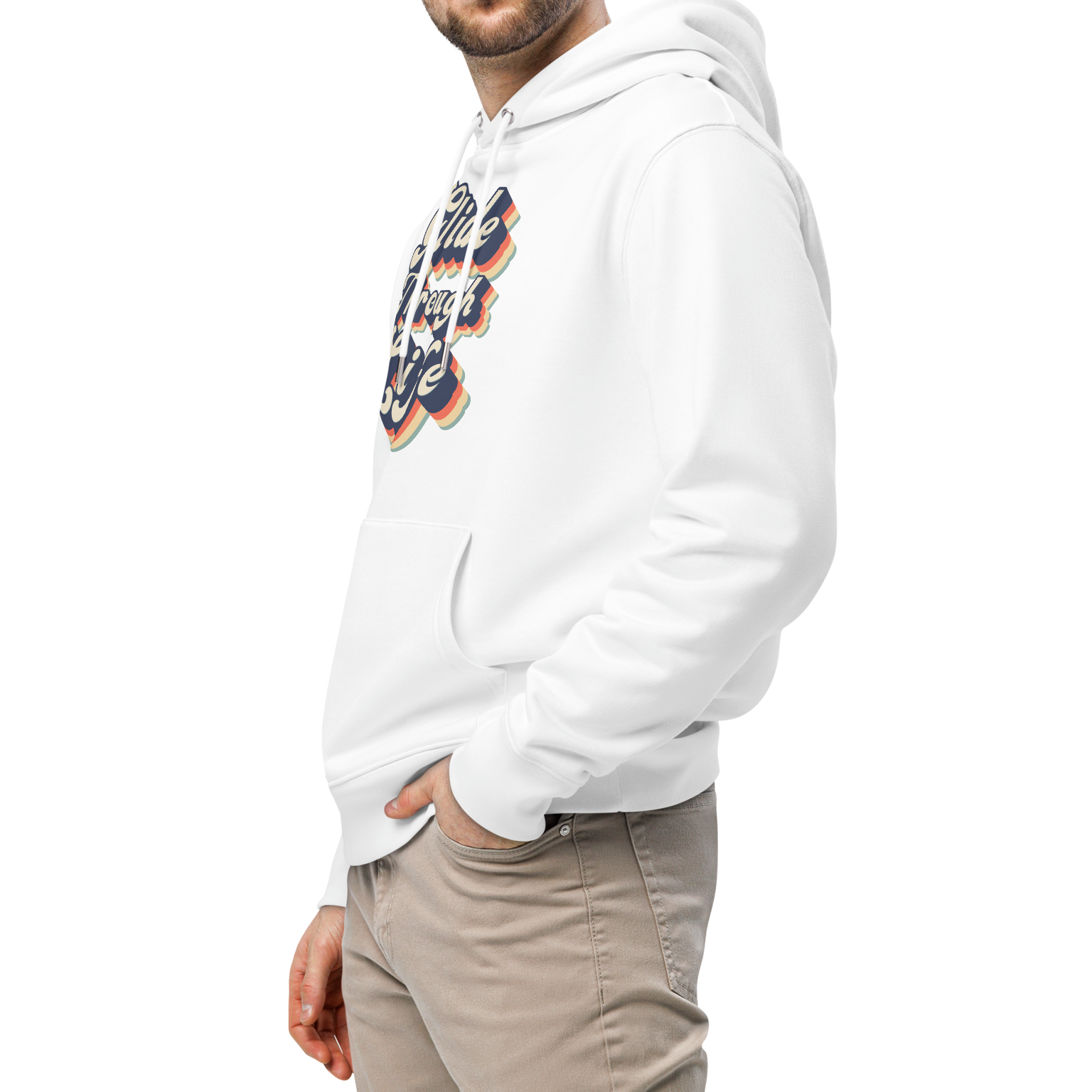 A man wearing an organic hoodie with "Glide Through Life" retro 3D typography on white GOTS and OCS certified cotton, designed for swimmer recovery paired with beige pants, photographed against a solid white background
