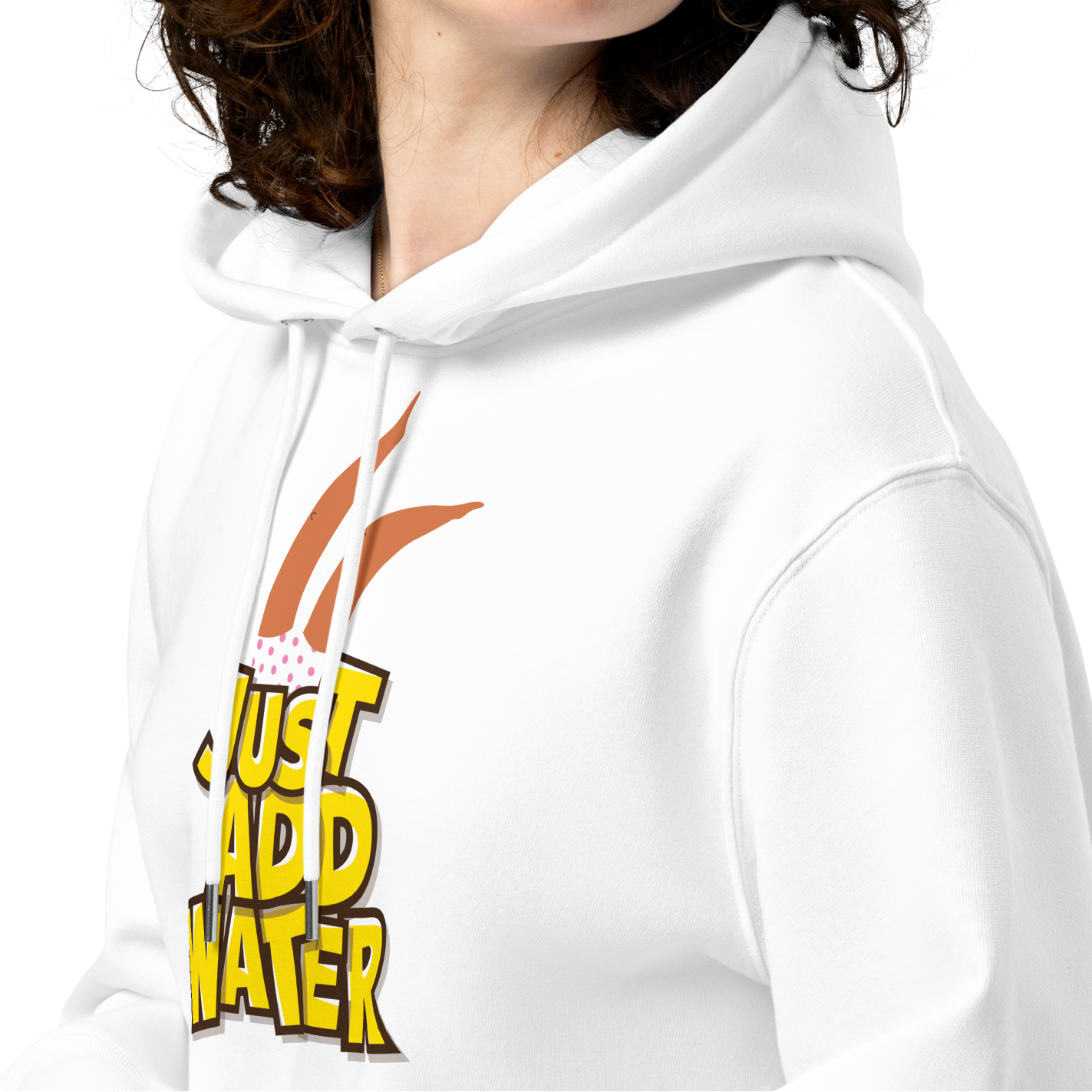A female person wearing an organic hoodie featuring a "Just Add Water" graphic with synchronized swimming legs on white GOTS certified organic cotton.