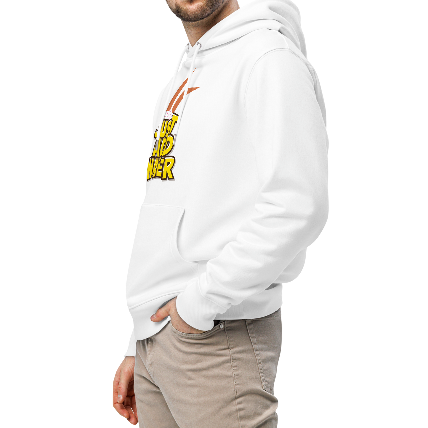 A man wearing an organic hoodie featuring a "Just Add Water" graphic with synchronized swimming legs on white GOTS certified organic cotton paired with beige pants, photographed against a solid white background.