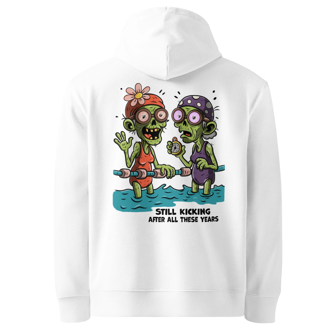 Organic hoodie in white with cartoon zombie swimmers and “Still Kicking After All These Years” Halloween graphic by Lane Line Threads, GOTS & OCS certified cotton.