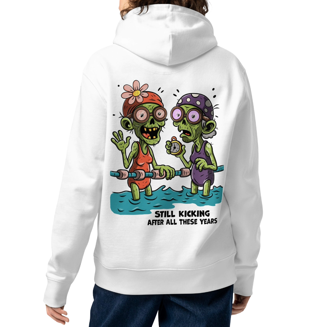  a female model from the back wearing an Organic hoodie in white with cartoon zombie swimmers and “Still Kicking After All These Years” Halloween graphic by Lane Line Threads, GOTS & OCS certified cotton.
