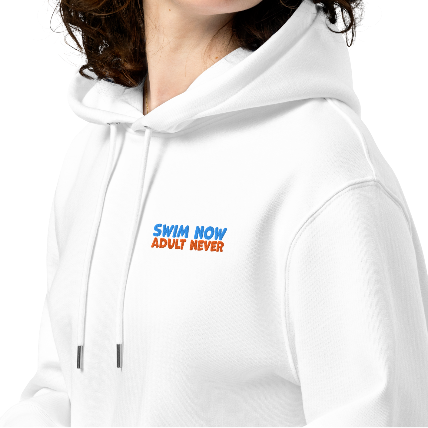 Female person wearing a white organic hoodie with the embroidered text "swim now adult never" by Lane Line Threads designed for post-swim skin health and GOTS certified comfort.
