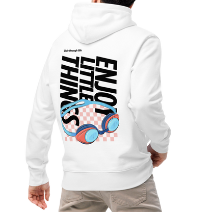A man shown from the back wearing an organic hoodie in white with colorful swim goggles and bold graphic text on the back, made from GOTS and OCS certified organic cotton, paired with beige pants and white sneakers, against a plain white background
