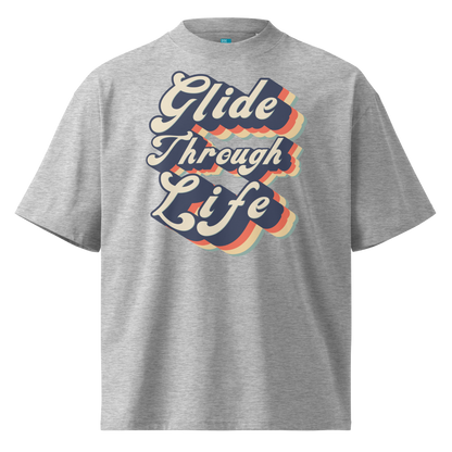 Organic oversized t-shirt by Lane Line Threads in grey with retro “Glide Through Life” layered swim graphic.