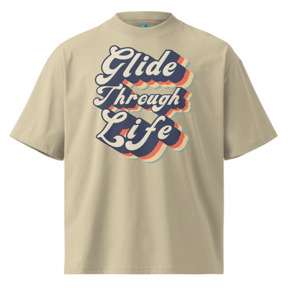 Organic oversized t-shirt by Lane Line Threads in beige with retro “Glide Through Life” layered swim graphic