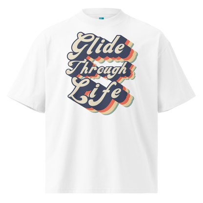 Organic oversized t-shirt by Lane Line Threads in white with retro “Glide Through Life” layered swim graphic