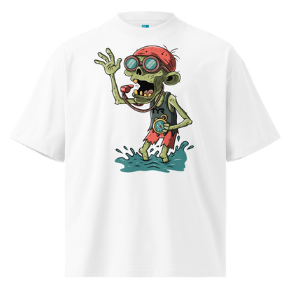 A white short-sleeve crewneck Halloween organic oversized t-shirt by Lane Line Threads, featuring a colorful graphic of a zombie wearing a red swimming cap, swim goggles, and a black TYR tank, standing in splashing water.