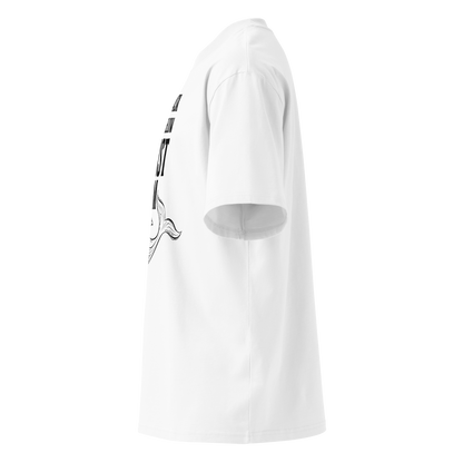 Organic oversized t-shirt in white with whale graphic and “I DON’T ASK WHAT’S BELOW I JUST SWIM” design shown from the left side