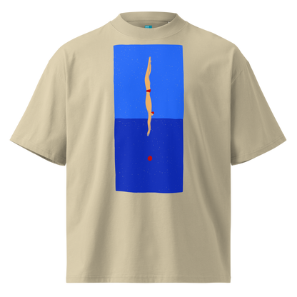 A beige short-sleeve crewneck organic oversized t-shirt by Lane Line Threads featuring a graphic print of a minimalist figure diving into a blue water scene, displayed on a clean white background.