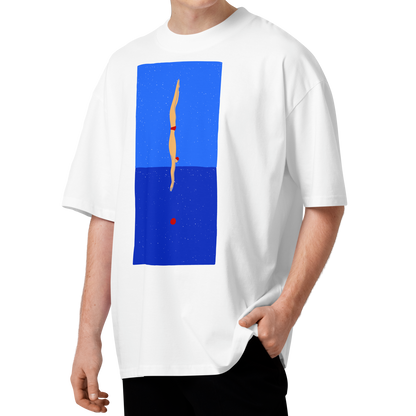 A man with curly brown hair wearing a white short-sleeve crewneck organic oversized t-shirt by Lane Line Threads featuring a graphic print of a minimalist figure diving into a blue water scene, displayed on a clean white background.