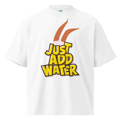 A white short-sleeve crewneck organic oversized t-shirt by Lane Line Threads featuring a graphic print of woman legs wearing a pink polka-dot swimsuit, with the text 'JUST ADD WATER' in bold yellow letters with black outlines.