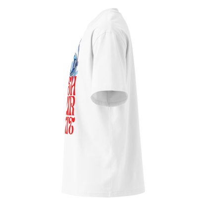 A white short-sleeve crewneck organic oversized t-shirt by Lane Line Threads featuring a graphic print of blue swim goggles above the text 'PUSH YOUR LIMIT' in a bold red retro font shown from the left side.
