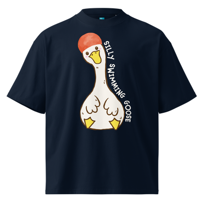 A navy blue short-sleeve organic oversized t-shirt by Lane Line Threads featuring a cartoon graphic of a white swimming goose wearing a red swim cap, with the text 'SILLY SWIMMING GOOSE' printed vertically alongside it.