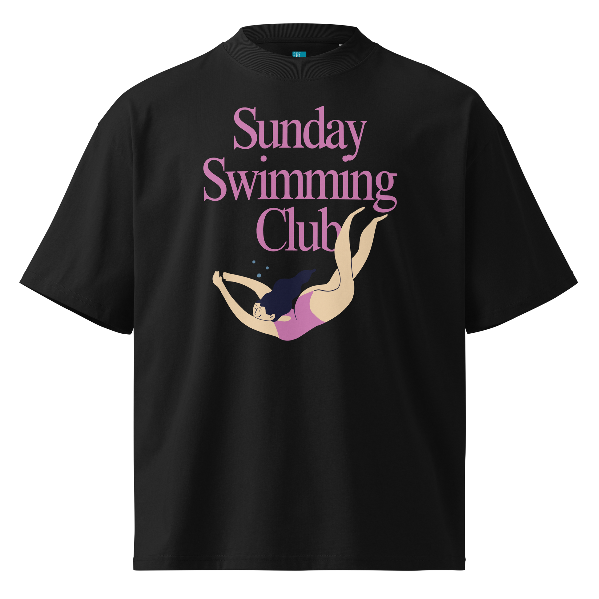 A black short-sleeve crewneck organic oversized t-shirt featuring a graphic print on the front with the text 'Sunday Swimming Club' in pink and an illustration of a woman diving underwater.