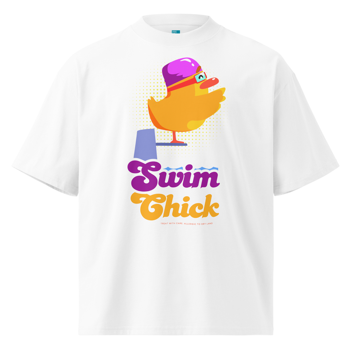 A white short-sleeve crewneck organic oversized t-shirt by Lane Line Threads featuring a colorful graphic of a yellow duck wearing a purple swim cap and goggles, with the text 'Swim Chick' printed below in purple and orange.
