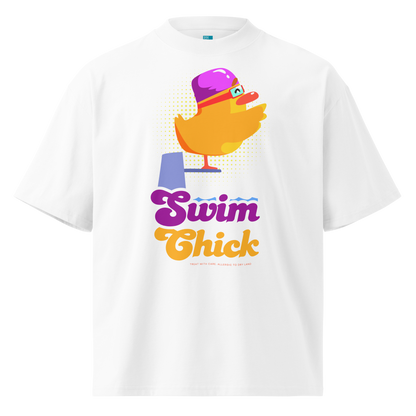 A white short-sleeve crewneck organic oversized t-shirt by Lane Line Threads featuring a colorful graphic of a yellow duck wearing a purple swim cap and goggles, with the text 'Swim Chick' printed below in purple and orange.