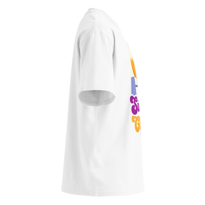 A white short-sleeve crewneck organic oversized t-shirt by Lane Line Threads featuring a colorful graphic of a yellow duck wearing a purple swim cap and goggles, with the text 'Swim Chick' printed below in purple and orange, shown from the right side.
