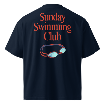 Organic oversized t-shirt in navy blue with Sunday Swimming Club graphic and swim goggles design on the back