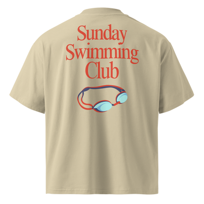 Organic oversized t-shirt in beige with Sunday Swimming Club graphic and swim goggles design on the back