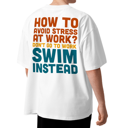 Back view of an organic oversized t-shirt with the message 'How to avoid stress at work? Don't go to work, swim instead'.