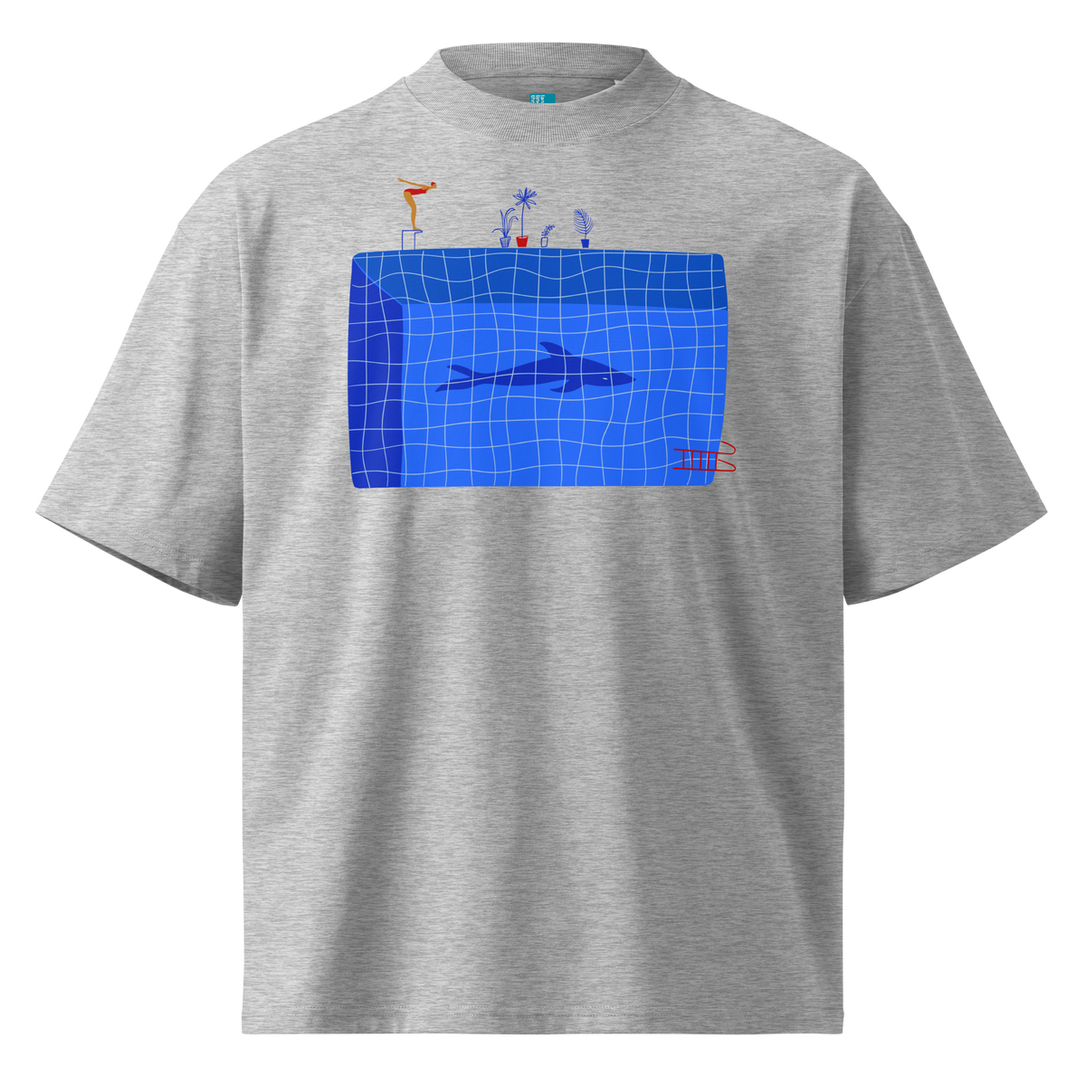 A gray short-sleeve crewneck organic oversized t-shirt by Lane Line Threads for swimmers featuring a graphic print of a blue swimming pool with a diving board, a diver, plants, and a shark on the front.