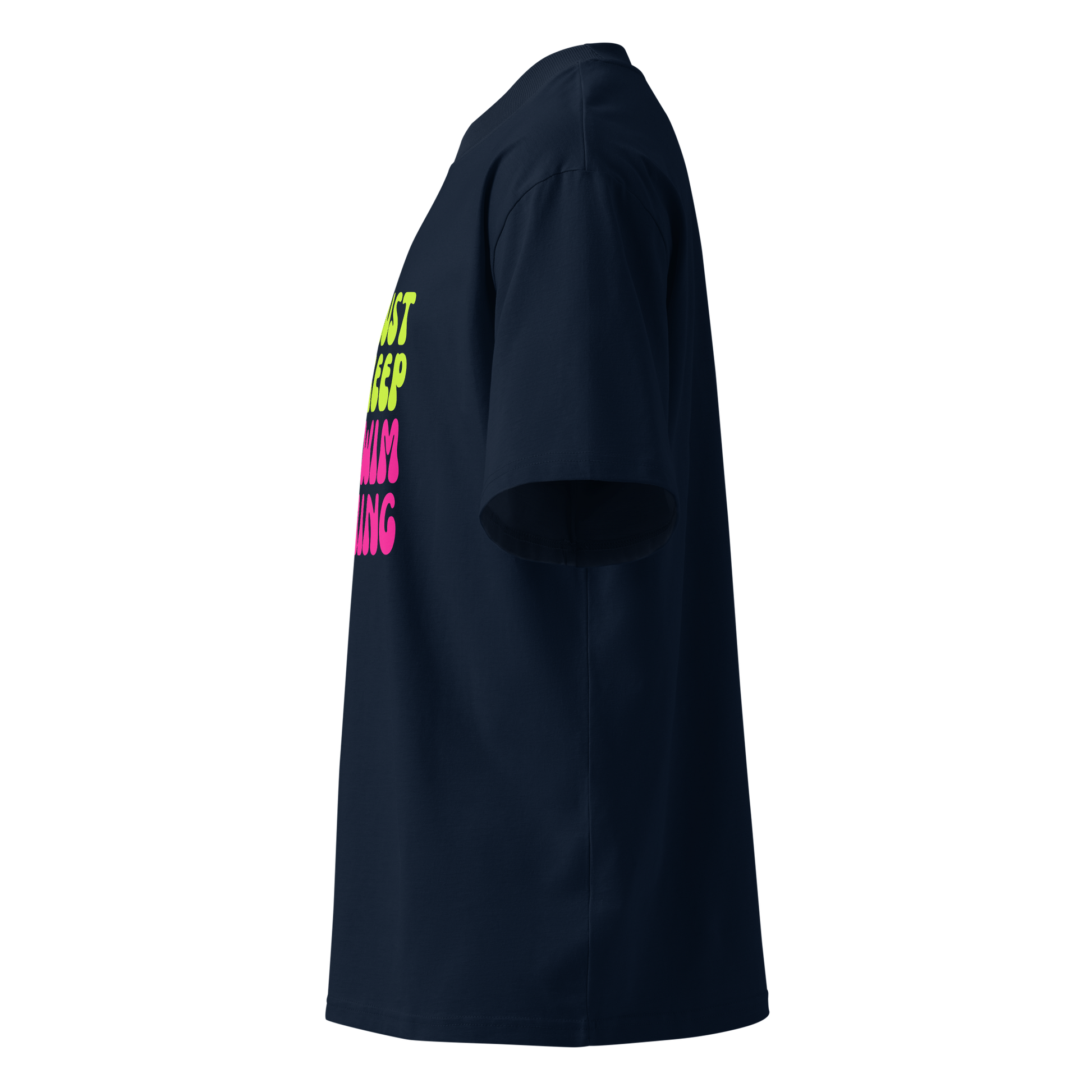 Organic oversized t-shirt in French Navy with colorful Just Keep Swimming swimmer graphic shown from a left side profile view