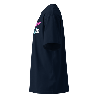 A navy blue short-sleeve organic oversized t-shirt by Lane Line Threads with a graphic on the chest featuring a pink and blue female swimmer silhouette above the text 'UNlimited' in white and light blue, shown from the left side.