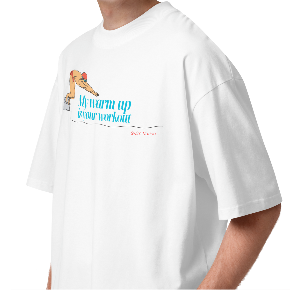 Person wearing a white short-sleeve crewneck organic oversized t-shirt by Lane Line Threads featuring a graphic of a swimmer on a diving block with the text 'My warm-up is your workout' in blue and 'Swim Nation' in red below.