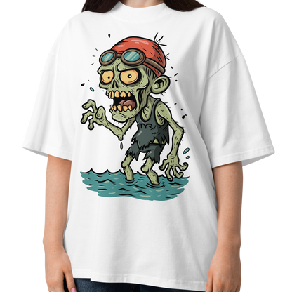 A woman wearing a white short-sleeve crewneck organic oversized t-shirt by Lane Line Threads, featuring a cartoon graphic of a zombie wearing a red swim cap and goggles, standing in water.