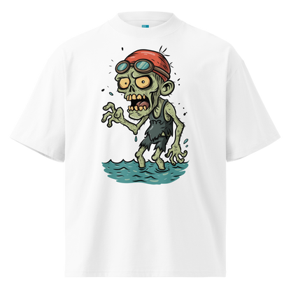 A white short-sleeve crewneck organic oversized t-shirt by Lane Line Threads, featuring a cartoon graphic of a zombie wearing a red swim cap and goggles, standing in water.