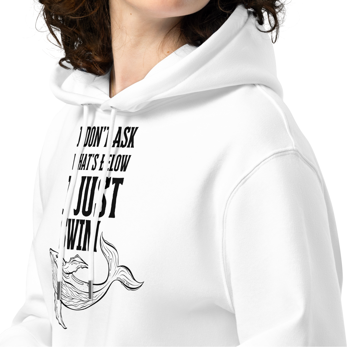 Person wearing a white post-swim organic hoodie with open-water swim themed text and whale graphic design on a white background