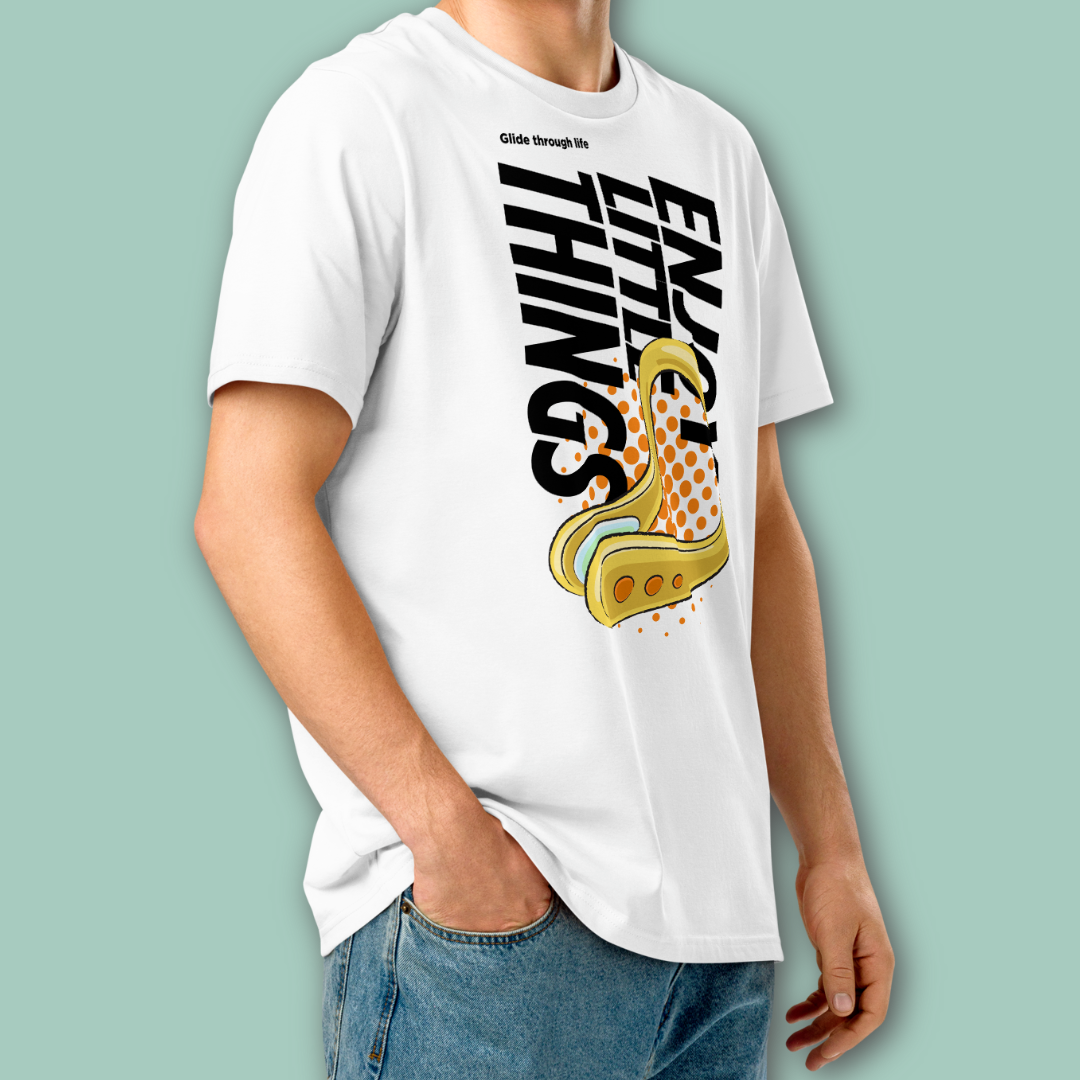 Person wearing a white post swim organic shirt with a swim-themed graphic design on a light green background