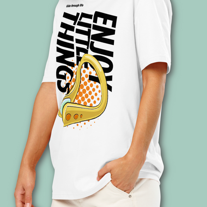 Person wearing white post swim organic shirt with a swim-themed graphic design and text on a light green background