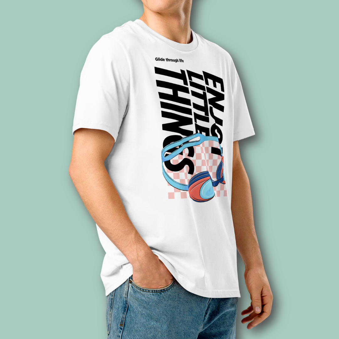 Person wearing a white organic post swim shirt with colorful swim-themed graphic design on a light green background