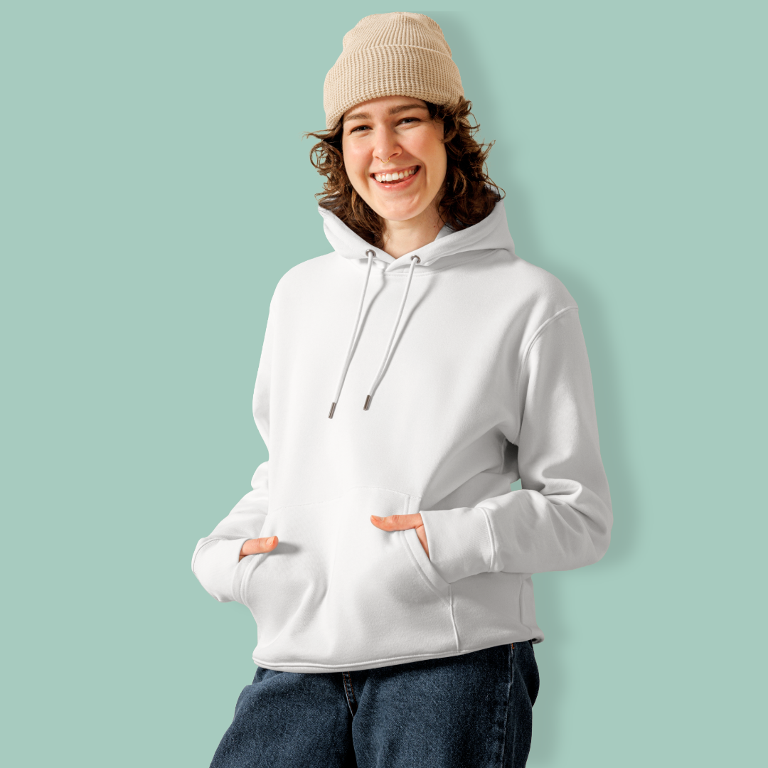 Person wearing a white swim mom organic hoodie and beige beanie against a light green background 