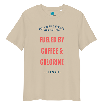 Desert dust organic swim mom shirt with red and navy text: “Fueled by Coffee & Chlorine – The Young Swimmer Mom Edition – Classic.”