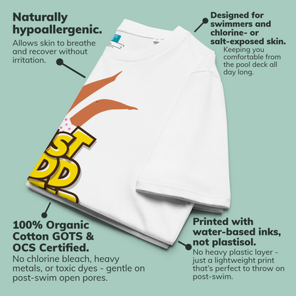 White organic swim shirt with colorful branding on a light green background, featuring text about product features.