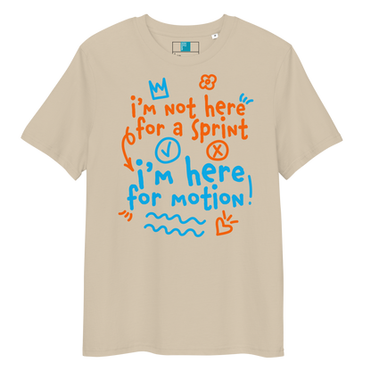 Beige organic swim shirt with “I’m Not Here for a Sprint, I’m Here for Motion!” text in orange and blue - sustainable tee for USMS swimmers with chlorine-tired skin.
