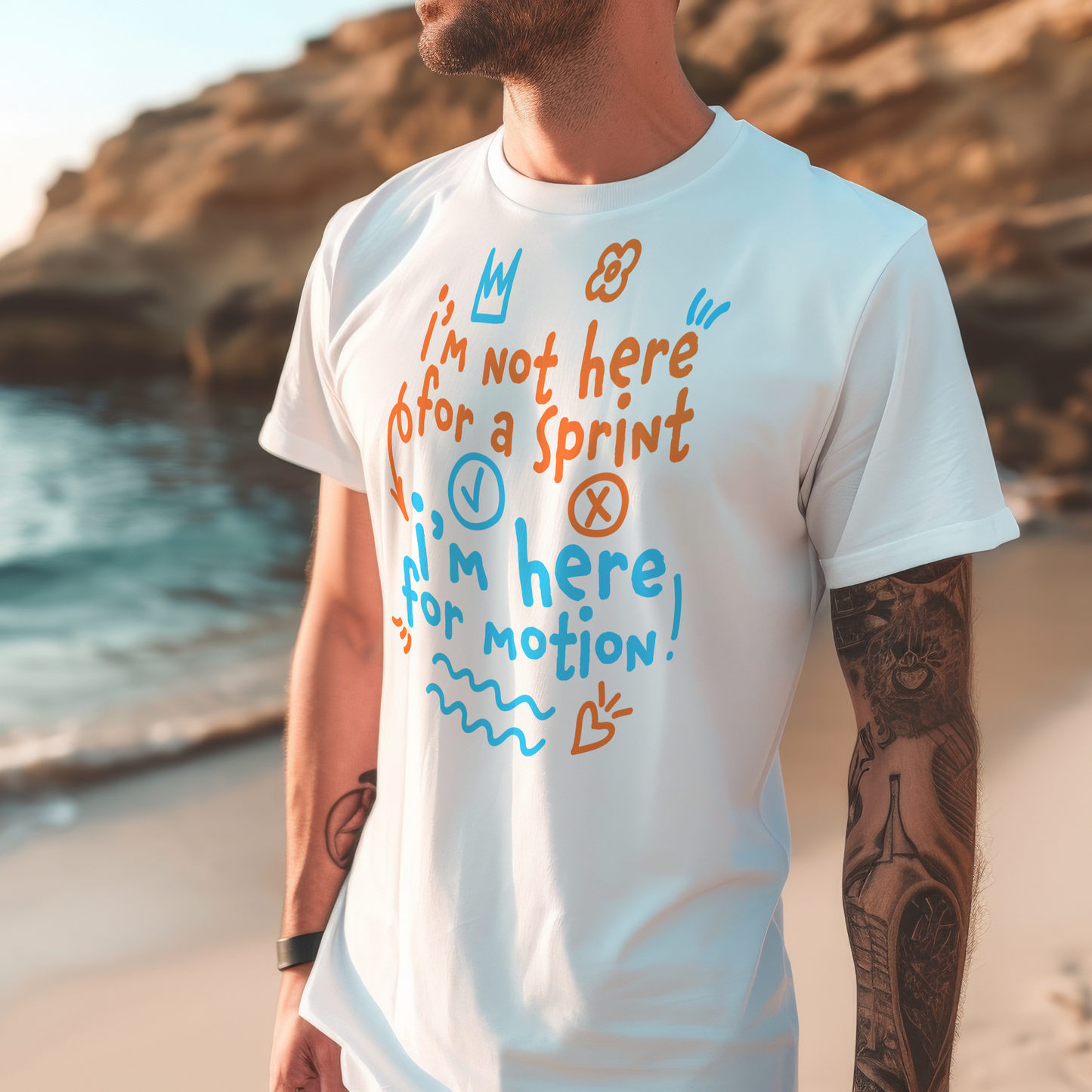 Man wearing an organic swim shirt with a motivational quote on a beach