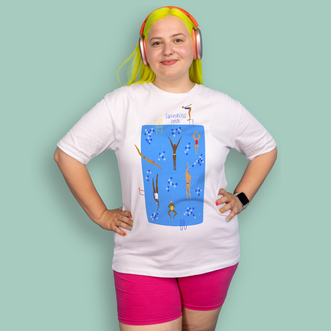 Person wearing a white organic swim shirt with a blue swimming pool graphic design on a light green background