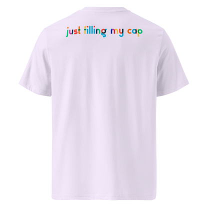 Lavender post-swim organic cotton t-shirt with colorful swim-themed text 'just filling my cap' on the back against a white background