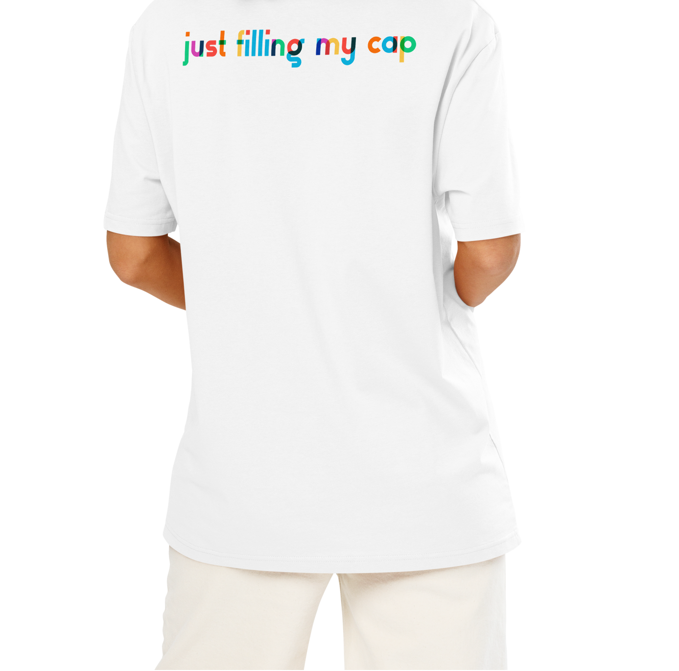Person wearing a white post swim organic cotton t-shirt with colorful swim-themed text on the back against a white background