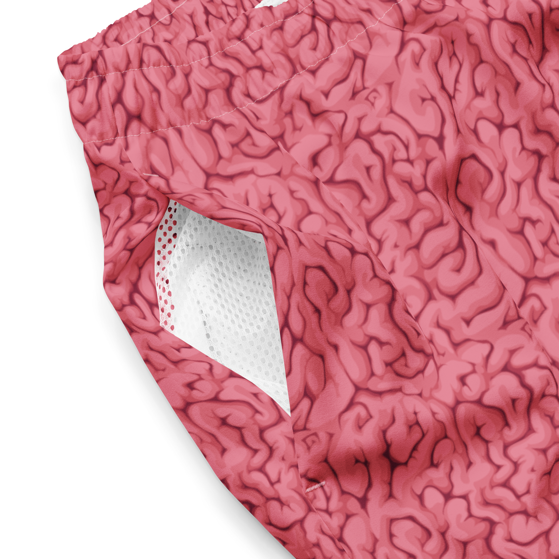 Close-up of Halloween pink brain textured organic swim trunks with a white mesh lining.